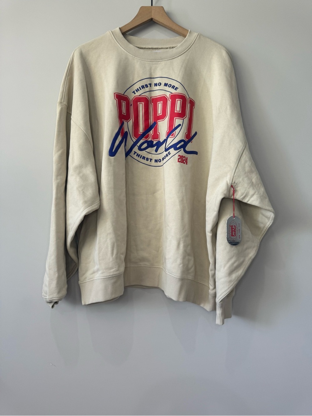 Poppi World NWT Graphic Crewneck Sweatshirt - Cream with Red & Blue Logo Size XL